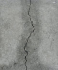 Close-up of a cracked concrete surface suitable for LCR Epoxy Concrete Crack Repair Kit Stop Leaks With High Performance Structural Bonding
