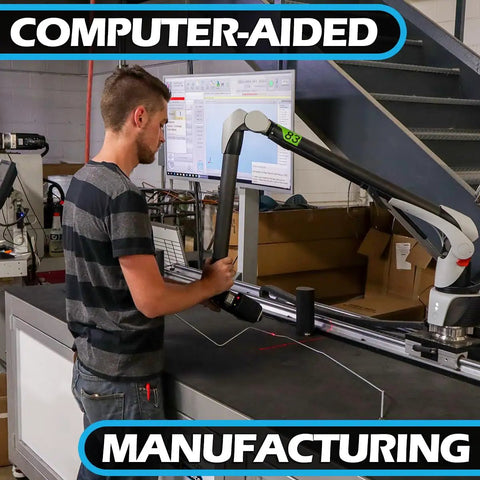 Technician using computer-aided machine for precision manufacturing in workshop.