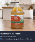 Top Shelf Pine Burst Multi Surface Cleaner 1 Gallon bottle on wooden kitchen floor, ideal for tough grease and odors.