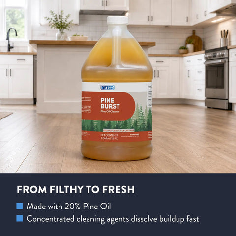 Top Shelf Pine Burst Multi Surface Cleaner 1 Gallon bottle on wooden kitchen floor, ideal for tough grease and odors.