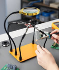 Helping Hands Soldering Station With 5X Magnifying Glass And 4 Flexible Arms, used for electronics repair on a yellow base.