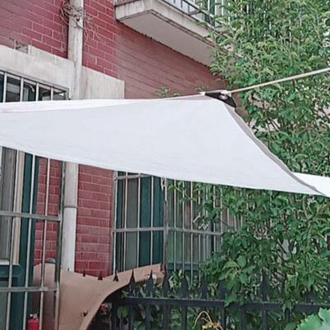 All-Weather Rectangle Sun Shade Sail For Outdoor Porch And Patio, UV Block And Rain Resistant Canopy Cover shown installed