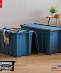 31 Gallon Storage Totes 8 Pack Built Like A Tank Heavy Duty Stackable Bins With Snap On Lids And Easy Grip Handles Eco Friendly Utility Tubs Made In USA Navy bins with blankets, integrated handles, and lids.