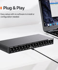 Sixteen Port Gigabit Unmanaged Ethernet Switch With Plug And Play Setup connected to laptop, fanless metal design