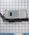 Top view of Two Pack Electronic Temperature Control Relay 120 To 240 Vac SPDT With 8 Foot Sensor resting on grid.