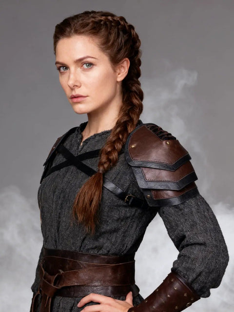 Woman wearing Battle Ready Leather Pauldron Shoulder Armor For Women, Viking Renaissance LARP Cosplay Gear In Brown