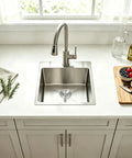 Drop In Bar Sink 15x15 Inch, Topmount Single Bowl, 16 Gauge Stainless Steel installed in a kitchen counter, view with grid and strainer.