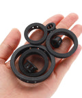Hand holding Round Cable Snap Bushing Grommets Pack Of 20, 1 Inch Black Snap In Protectors For Wires Hoses Tubes And Cords