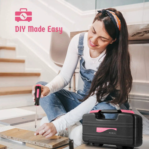 Woman using a screwdriver from the Compact 39 Piece Hand Tool Kit With Case For DIYers And Homeowners A Handy Starter Set in a Portable Pink Tool Box