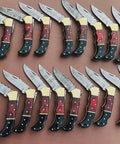 Handmade Folding Knife Set With Wood Handles featuring Damascus style steel blades, collectible wholesale lot of 20.