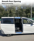 Side view of a white minivan with a sliding door using 1 Pair Sliding Rear Door Roller Top Bracket For Odyssey 2011 2012 2013 2014 2015 2016 2017 Left And Right Upper Bracket Replacement 72510-TK8-A01 Improves Door Response Reduces Shake And Jamming For Smoother Sliding, open on a sunny day with trees in the background.