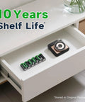 Solid As A Rock Cr2 Lithium Batteries 3V Non Rechargeable Cells Delivering Decade Long Reliable Juice Perfect For Rangefinders Nest Thermostats Smart Switches And Instant Fuji Cameras Two Pack Setup stored in a drawer with an instant camera.