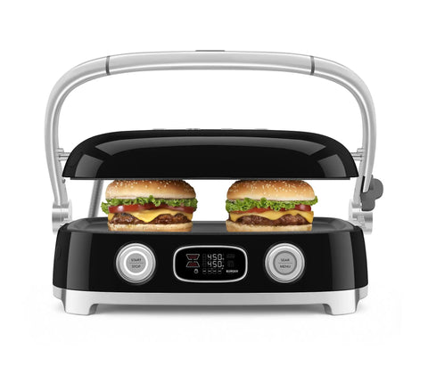 SMEG MGF01 Retro Countertop Electric Grill and Panini Press With Swappable Plates For Waffles, Burgers, And Steak grilling two burgers with cheese and lettuce.
