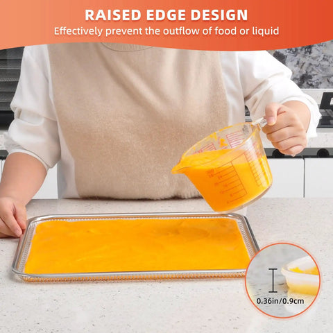 Person pouring liquid onto 4 Pack 14x14 Inch Silicone Dehydrator Trays With Raised Lip Edge Nonstick Sheets For Fruit Leather And Dried Foods Reusable Easy To Clean Dishwasher Safe Great For Fruits Vegetables Herbs Eggs Meat And Liquids on countertop