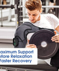 Man using Cordless Shoulder Heating Pad With Vibration Massage Wireless Heated Shoulder Wrap for pain relief during gym session.