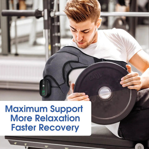 Man using Cordless Shoulder Heating Pad With Vibration Massage Wireless Heated Shoulder Wrap for pain relief during gym session.
