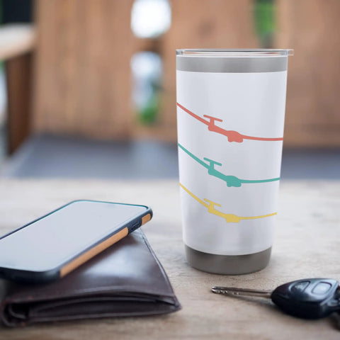 White insulated stainless steel tumbler with glider design on table, "Insulated Stainless Steel Tumbler For Glider Pilots And Aviation Nerds."