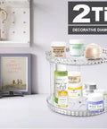 Two Tier Clear Diamond Lazy Susan Bathroom Organizer With Hella Smooth 360 Rotating Base featuring skincare products on a vanity countertop.