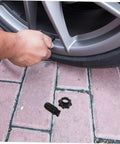 Durable Plastic Spare Tire Hold Down Bolt For Secure Mounting, Easy Installation, shown near wheel for reliable use