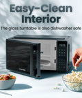 No Sweat Compact Countertop Microwave Oven 0.7 Cubic Foot 700 Watts Fast Heat One Touch Express Cooking Eco Chill with glass turntable.