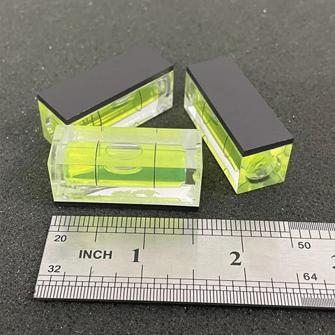 Two Pack Magnetic Bubble Level Set With Magnetic Base 15mm By 15mm By 40mm Compact Single Line Small Square Layout Tool shown with ruler