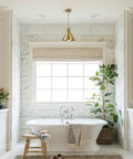 Brushed Gold Modern Cone Pendant Light For Kitchen Island And Hallway Brass Hanging Ceiling Lamp in a stylish bathroom.
