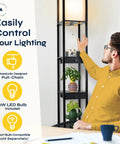 Man adjusting 72 Inch Floor Lamp With Dope Shelves And Drawers For Living Rooms And Bedrooms Tall Sturdy Standing Lamp With Built In Storage