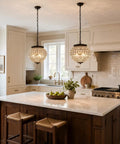 14 inch Crystal Pendant Light, 2-Light Antique Bronze Small Chandelier hanging above a kitchen island with apples.