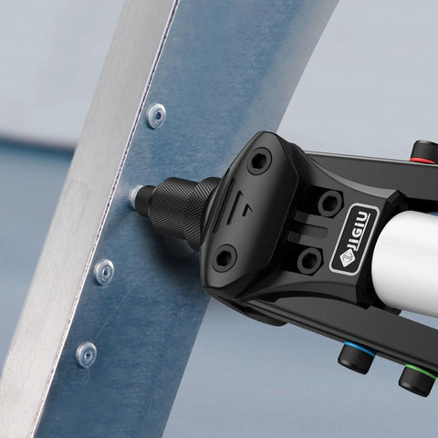 Beefy Heavy Duty 1/4 Inch Rivet Gun Kit attaching rivets to metal surface for DIY and home use.