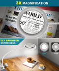 Magnifying Glass With Light And Stand 3X Magnifier Lens With Clamp Desk Magnifying Lamp over a newspaper and desk setup.