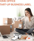 Woman using 4x6 Thermal Direct Shipping Labels Pack Of 500 Fanfold Commercial Grade For Easy Shipping And Fulfillment Compatible With FedEx UPS USPS Shopify Etsy Amazon eBay Poshmark Mercari And More with printer and boxes