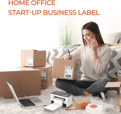 Woman using 4x6 Thermal Direct Shipping Labels Pack Of 500 Fanfold Commercial Grade For Easy Shipping And Fulfillment Compatible With FedEx UPS USPS Shopify Etsy Amazon eBay Poshmark Mercari And More with printer and boxes