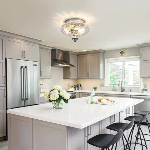 Modern Two Light Hammered Glass Flush Mount Ceiling Light In Chrome Finish, shown in a bright kitchen, 10.2 inch diameter.