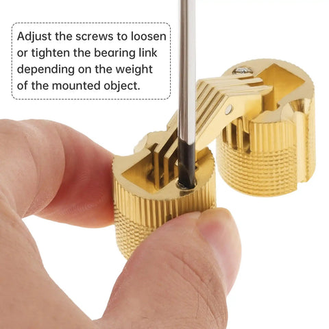 Adjusting screws on an eight piece set of eighteen millimeter concealed brass barrel hinges for cabinet doors.