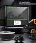 PC-ABS 3D Filament 1.75mm 1Kg Spool White Hybrid with Sunlu filament dryer and industrial robot model displayed.