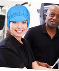 Blue Anti Static Work Caps 5 Pack Breathable Polyester Mesh Hat worn by a smiling woman at a workplace.