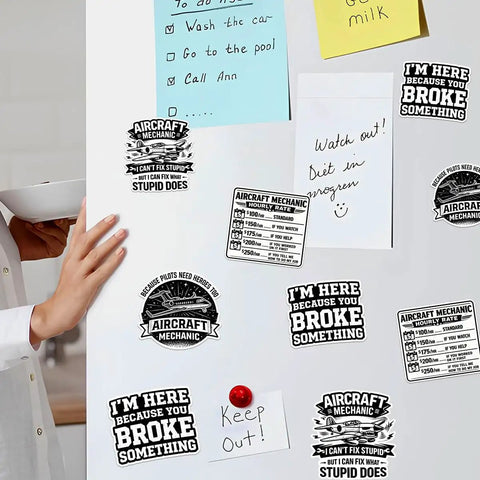 12 Piece Aircraft Mechanic Stickers Pack Dope Aviation Decals For Planes And Maintenance Techs on a fridge with notes