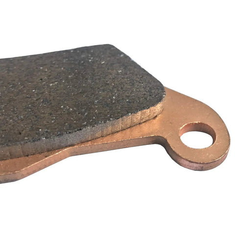 Close-up of Heavy Duty Front And Rear Brake Pads For Can Am Outlander 450 500 570 650 800R 850 1000 650 Max ATV showing sintered copper material.