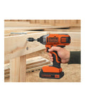 Cordless Drill And Impact Driver Combo Kit With 20V Max Battery And Charger being used on wood beam, three eighths inch chuck, 11 position clutch.