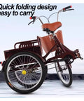 Adult Folding Three Wheel Tricycle With Front And Rear Dual Brakes displayed folded with comfort saddle and rear cargo cabin.
