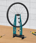 Must Have Wheel Truing Stand For 27.5 To 29 Inch Wheels, Heavy Duty High Carbon Steel Repair Tool on wooden surface