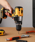 Person using drill with Six Pack Drill Bit Holder Holster With High Strength Adhesive, side-mount bit gripper attached, on table
