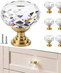 Six Pack Swanky Clear Faceted Glass Cabinet Knobs With Trendy Gold Alloy Base on drawer with screws for easy installation.