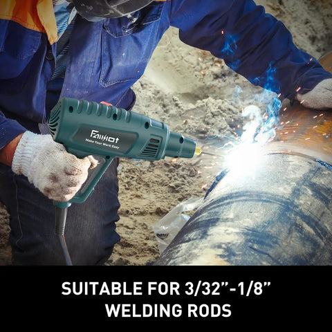 User welding pipe with Portable 110V Welding Machine Kit With IGBT Inverter Arc Welder, handheld MMA gun, on sandy ground