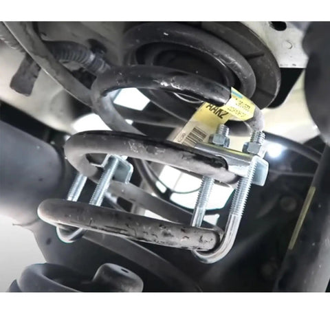 Close-up of 8 Pack Adjustable Coil Spring Lowering And Leveling Clamp Kit For Trucks And SUVs Fine Tune Your Suspension Ride Height.