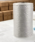 Air Cushion Wrap Roll 984ft Inflatable Bubble Cushions For Packaging And Shipping Supplies on table with boxes in background