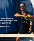 Player holding G2 Integra Edgeless Pickleball Paddle Black 8 Oz Lightweight Core 14mm Thickness in action on court
