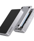 Legit External M.2 NVMe SSD Adapter For PCIe 5.0 Drives showing silver aluminum enclosure with dual chip design and open access.