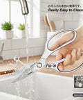 Person washing Japanese Kitchen Scissors All Purpose Heavy Duty Kitchen Shears With Ergonomic Handle under faucet.