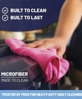 Person using pink microfiber cloth on stove, showcasing Lint Free Microfiber Cloths 12 Pack 12x12 Go To Auto Detailing Glass Windows Screens And Home Cleaning Heavy Duty Rags Washable Over 300 Times Streak Free Finish Pro Grade Towel Set.